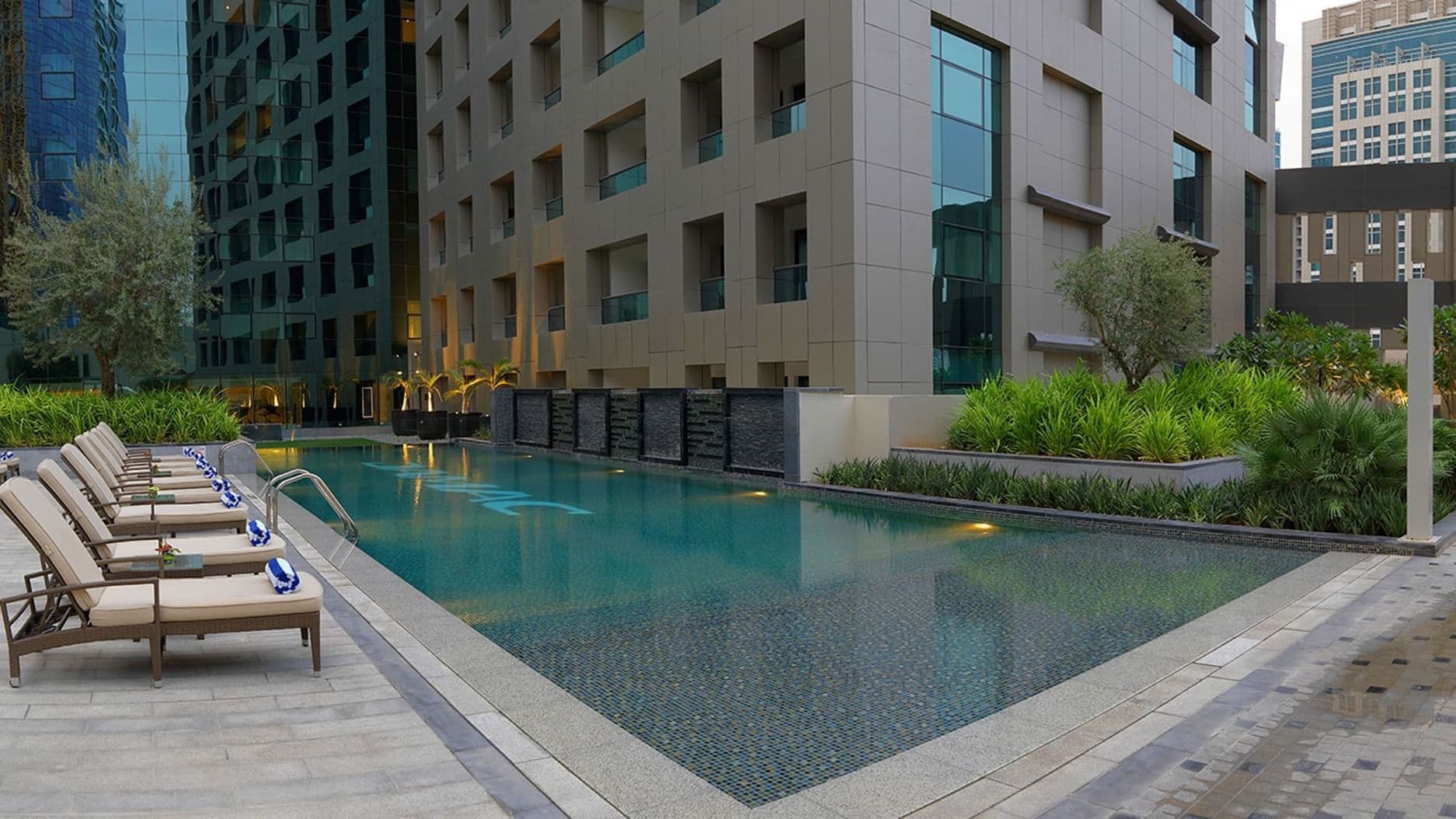 DAMAC Maison Cour Jardin foto 1